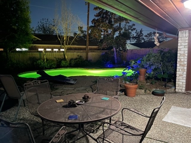 view of patio / terrace with outdoor dining space and a fenced backyard