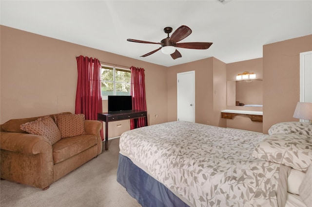 bedroom with ceiling fan and carpet