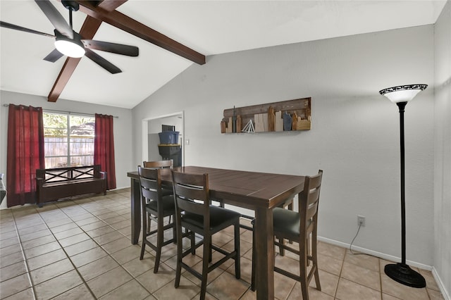 dining room with lofted ceiling with beams, ceiling fan, and light tile patterned flooring