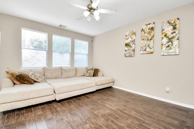 6059 Shelbourne Park Ln, Houston, TX 77084 - living area featuring dark wood-style floors, ceiling fan, and baseboards