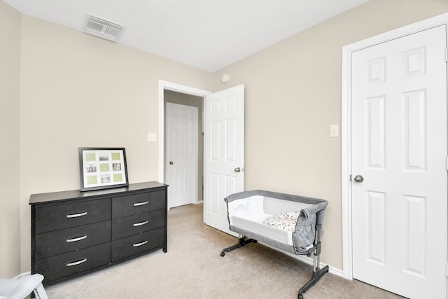 living area with light colored carpet