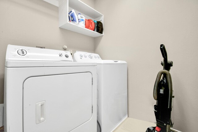 6059 Shelbourne Park Ln, Houston, TX 77084 - laundry room with independent washer and dryer
