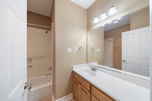 bathroom featuring vanity and shower / bathing tub combination