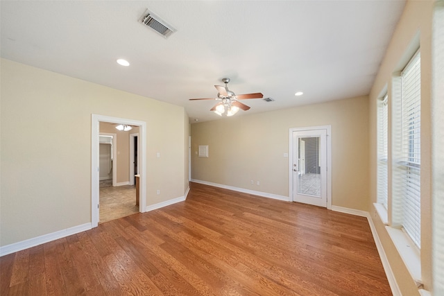 unfurnished bedroom featuring ceiling fan and light hardwood / wood-style flooring