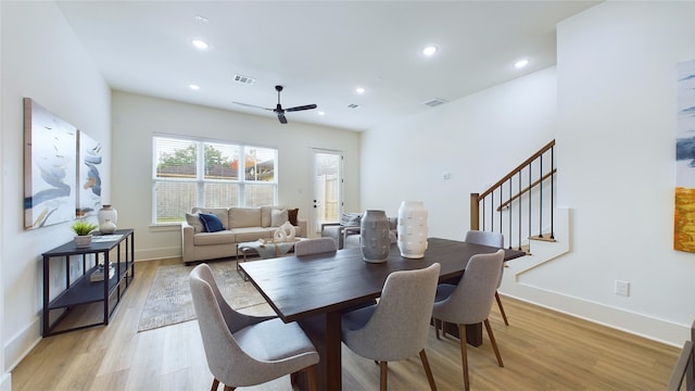 dining room featuring ceiling fan and light hardwood / wood-style flooring