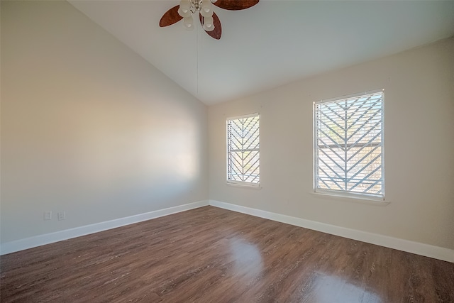 spare room with ceiling fan, high vaulted ceiling, and wood-type flooring