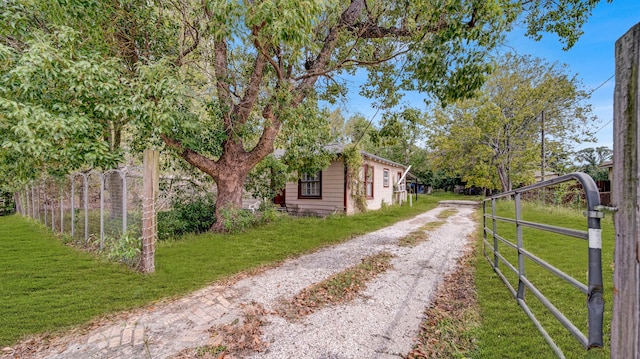 view of home's exterior featuring a lawn