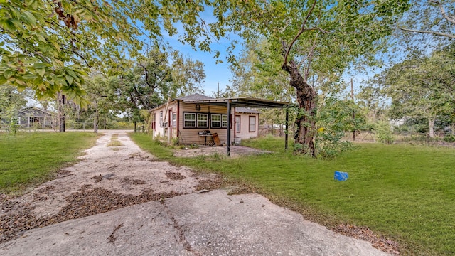 exterior space featuring a front yard