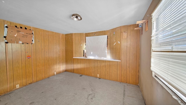 empty room with wooden walls