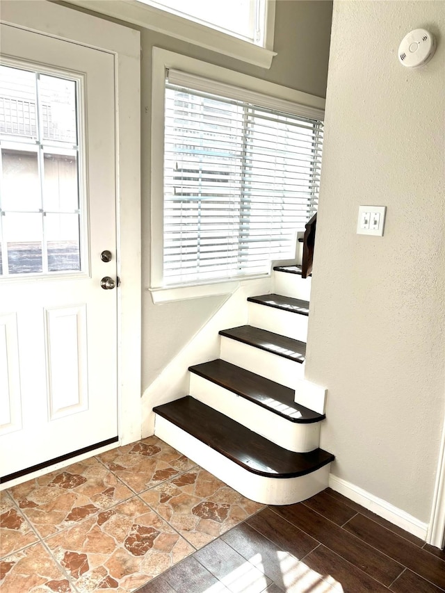 2333 Bering Dr Unit 139, Houston, TX 77057 - interior space with baseboards, wood finished floors, and a textured wall