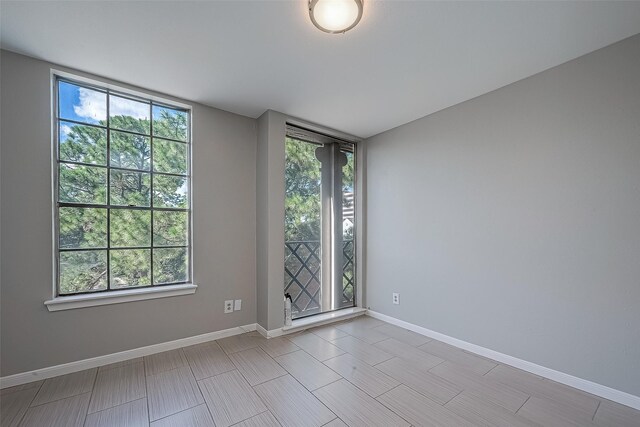 spare room featuring a wealth of natural light