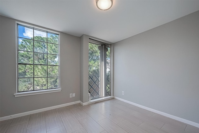 2333 Bering Dr Unit 139, Houston, TX 77057 - empty room with healthy amount of natural light and baseboards