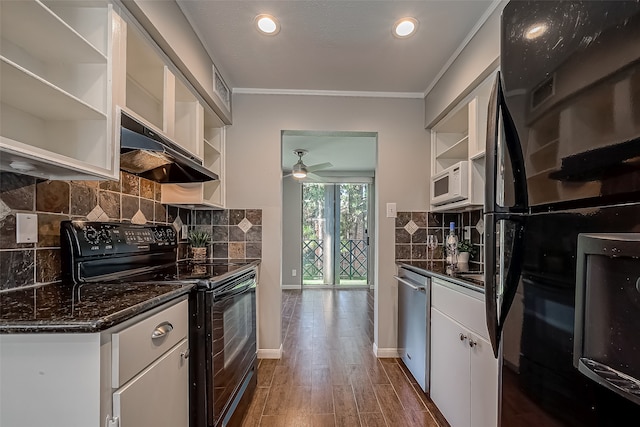 kitchen with white cabinetry, tasteful backsplash, dark hardwood / wood-style floors, crown molding, and black appliances