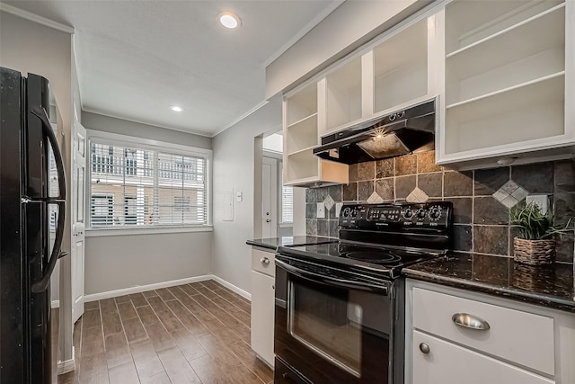 2333 Bering Dr Unit 139, Houston, TX 77057 - kitchen with black appliances, under cabinet range hood, open shelves, tasteful backsplash, and baseboards