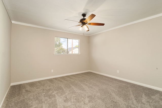 unfurnished room with crown molding, carpet flooring, and ceiling fan