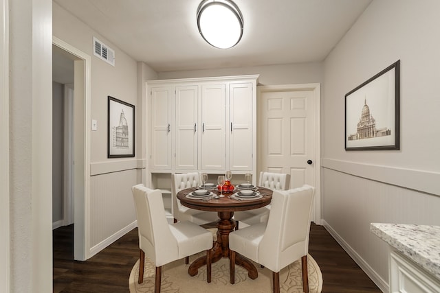 dining room featuring dark hardwood / wood-style floors