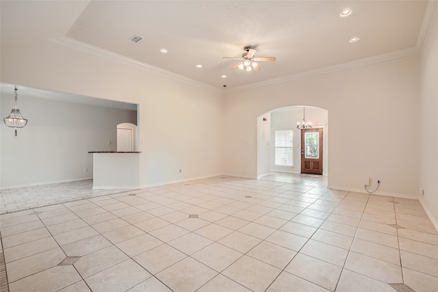 unfurnished room with ornamental molding, light tile patterned flooring, and ceiling fan