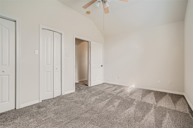 unfurnished bedroom with carpet floors, ceiling fan, and vaulted ceiling