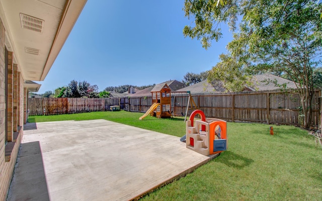 view of patio featuring a playground