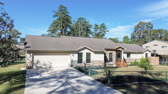 ranch-style home with a front lawn and a garage