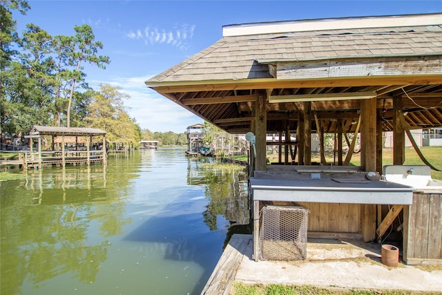 view of dock featuring a water view