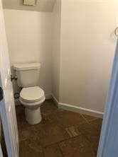 bathroom with tile patterned floors and toilet