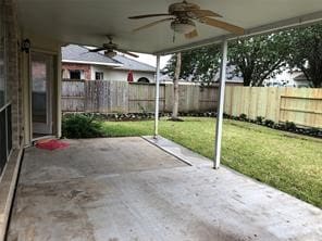 view of patio / terrace featuring ceiling fan