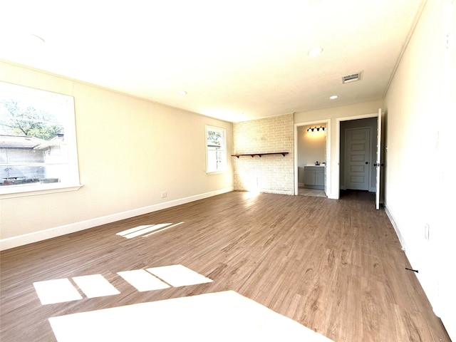 unfurnished room featuring wood-type flooring