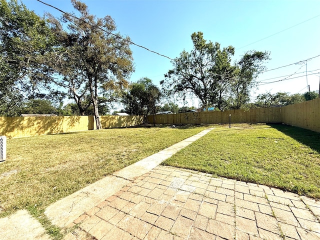 view of yard with a patio area