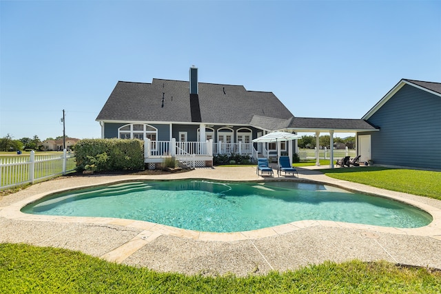 view of swimming pool with a patio