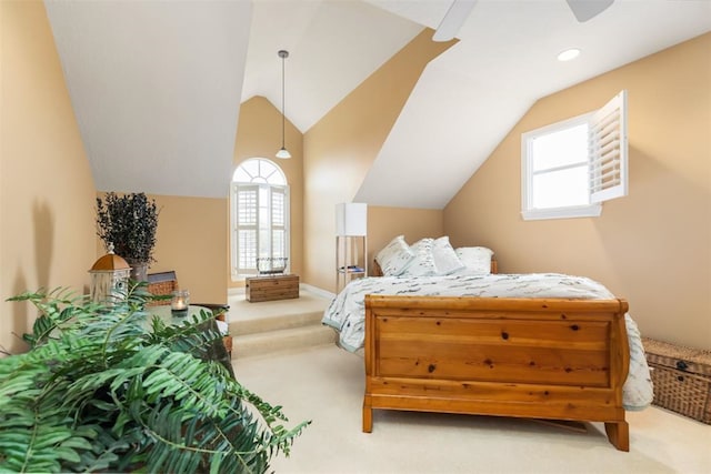 carpeted bedroom featuring lofted ceiling