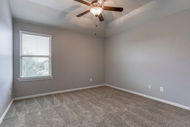 spare room featuring carpet floors and ceiling fan