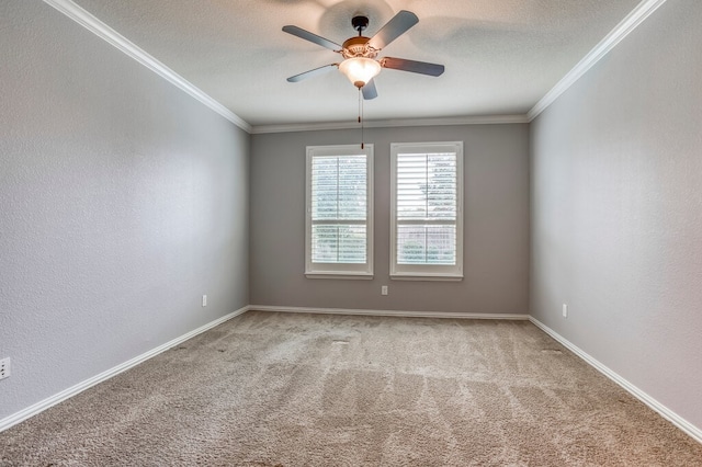 unfurnished room featuring light carpet, crown molding, a textured ceiling, and ceiling fan