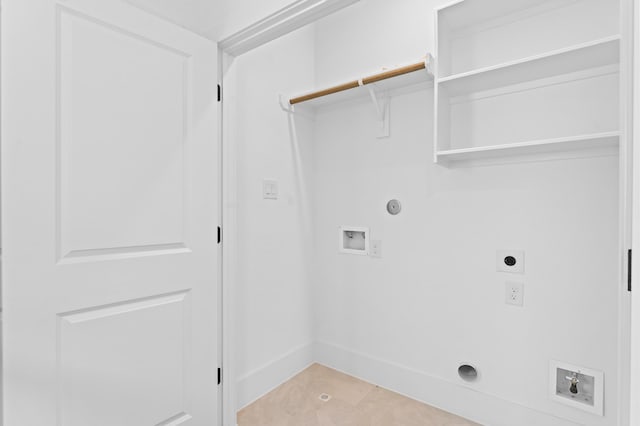 laundry area featuring hookup for an electric dryer, hookup for a washing machine, hookup for a gas dryer, and light tile patterned flooring