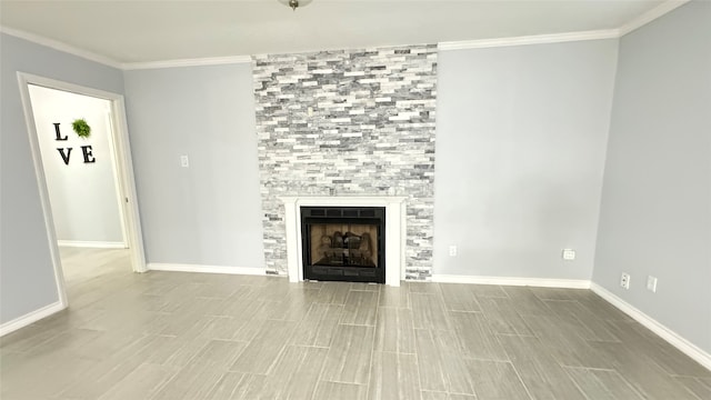 unfurnished living room featuring ornamental molding, light hardwood / wood-style flooring, and a fireplace