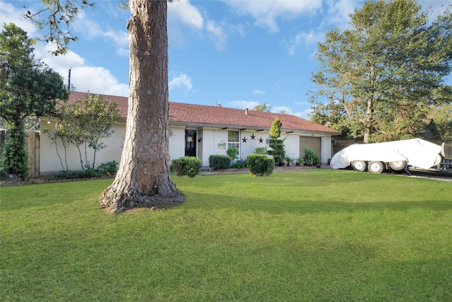 view of front of property with a front lawn