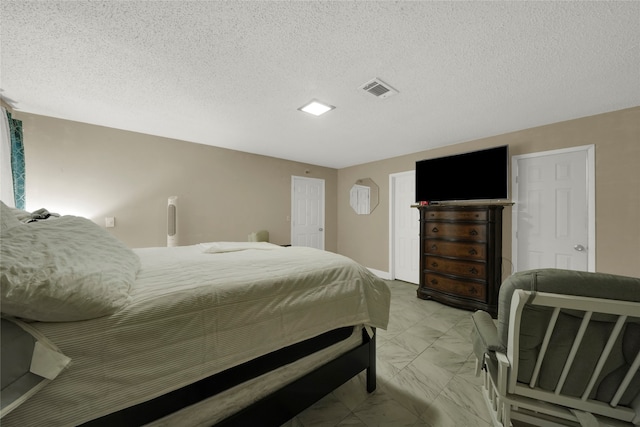 bedroom with a textured ceiling