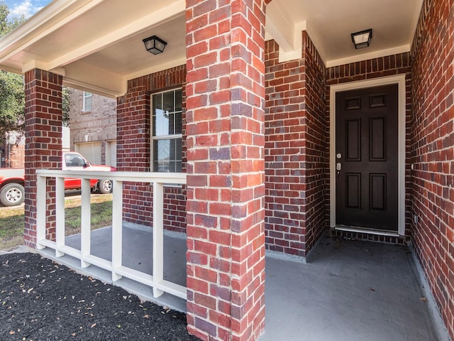 property entrance with a porch