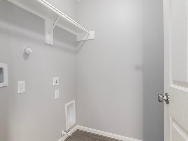 laundry area with hookup for an electric dryer, hookup for a gas dryer, dark wood-type flooring, and washer hookup