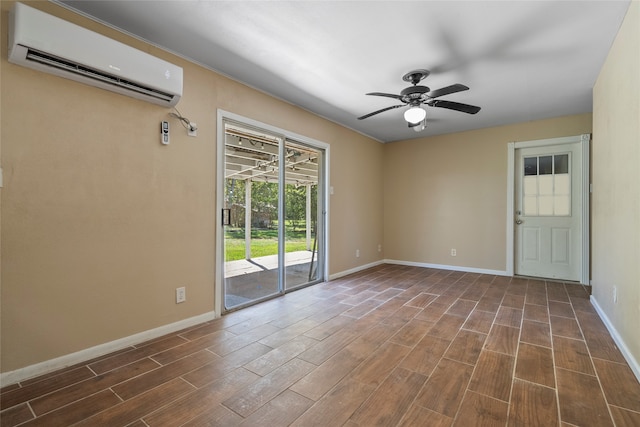 empty room with ceiling fan, a wall unit AC, and dark hardwood / wood-style flooring