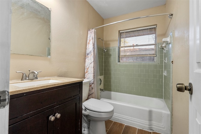 full bathroom with vanity, toilet, hardwood / wood-style flooring, and shower / bath combo with shower curtain