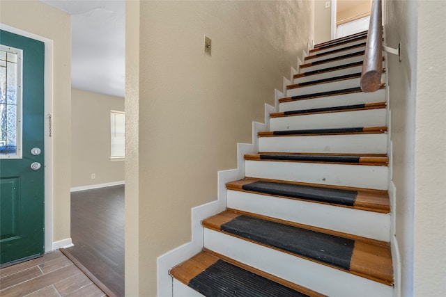 foyer featuring a healthy amount of sunlight and light wood-type flooring