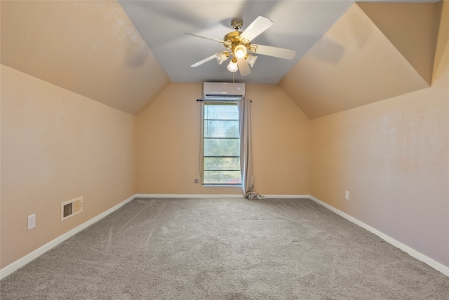 additional living space featuring ceiling fan, lofted ceiling, and carpet floors