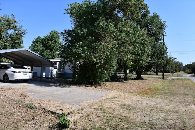 exterior space featuring a carport