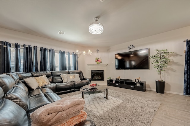 living room with light hardwood / wood-style flooring