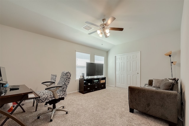 carpeted office with vaulted ceiling and ceiling fan