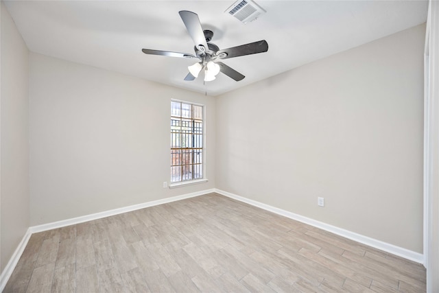 empty room featuring light hardwood / wood-style floors and ceiling fan