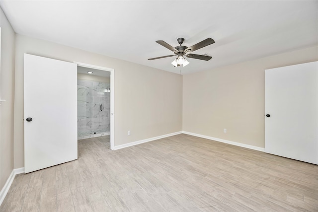 spare room with ceiling fan and light hardwood / wood-style flooring