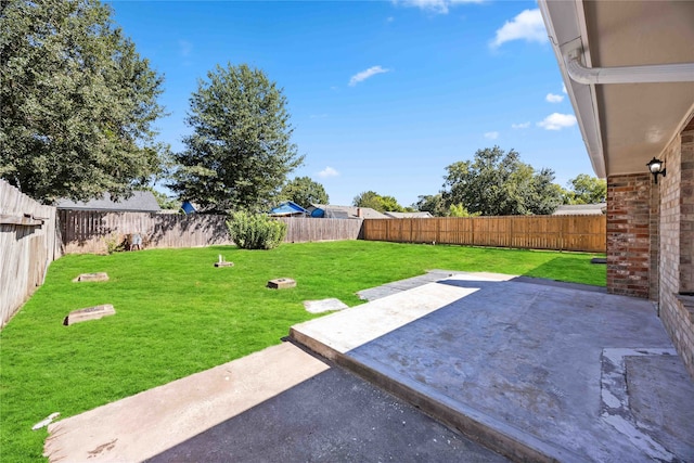 view of yard with a patio area