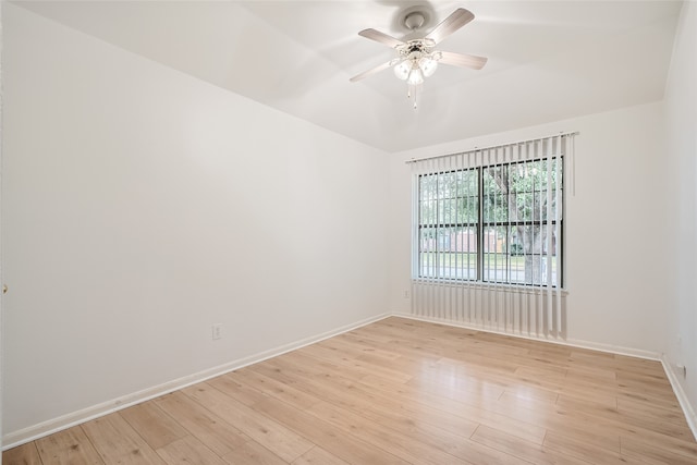 empty room featuring light hardwood / wood-style flooring and ceiling fan